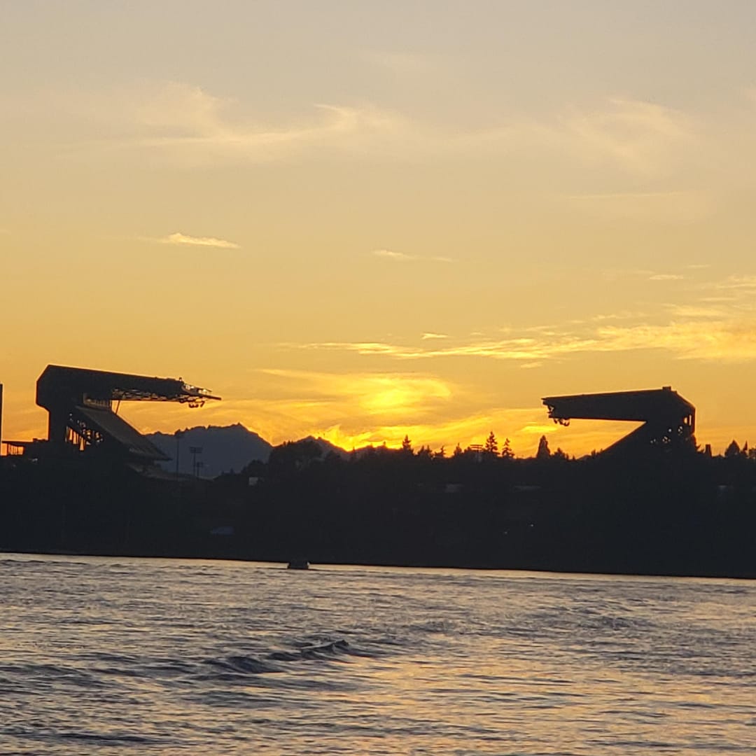 Husky stadium in the sunset from Lake Washington #nature #natureporn